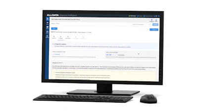 Desktop computer displaying ALLDATA diagnostic software with vehicle service information and analysis tools