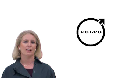 Professional woman in dark blazer with Volvo logo featuring circular design and upward arrow